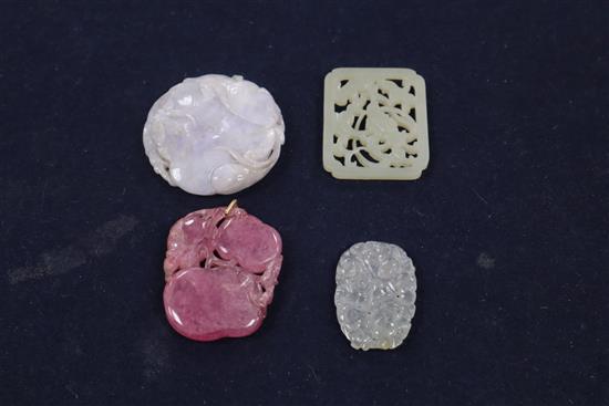 Four Oriental jade and hardstone pendants